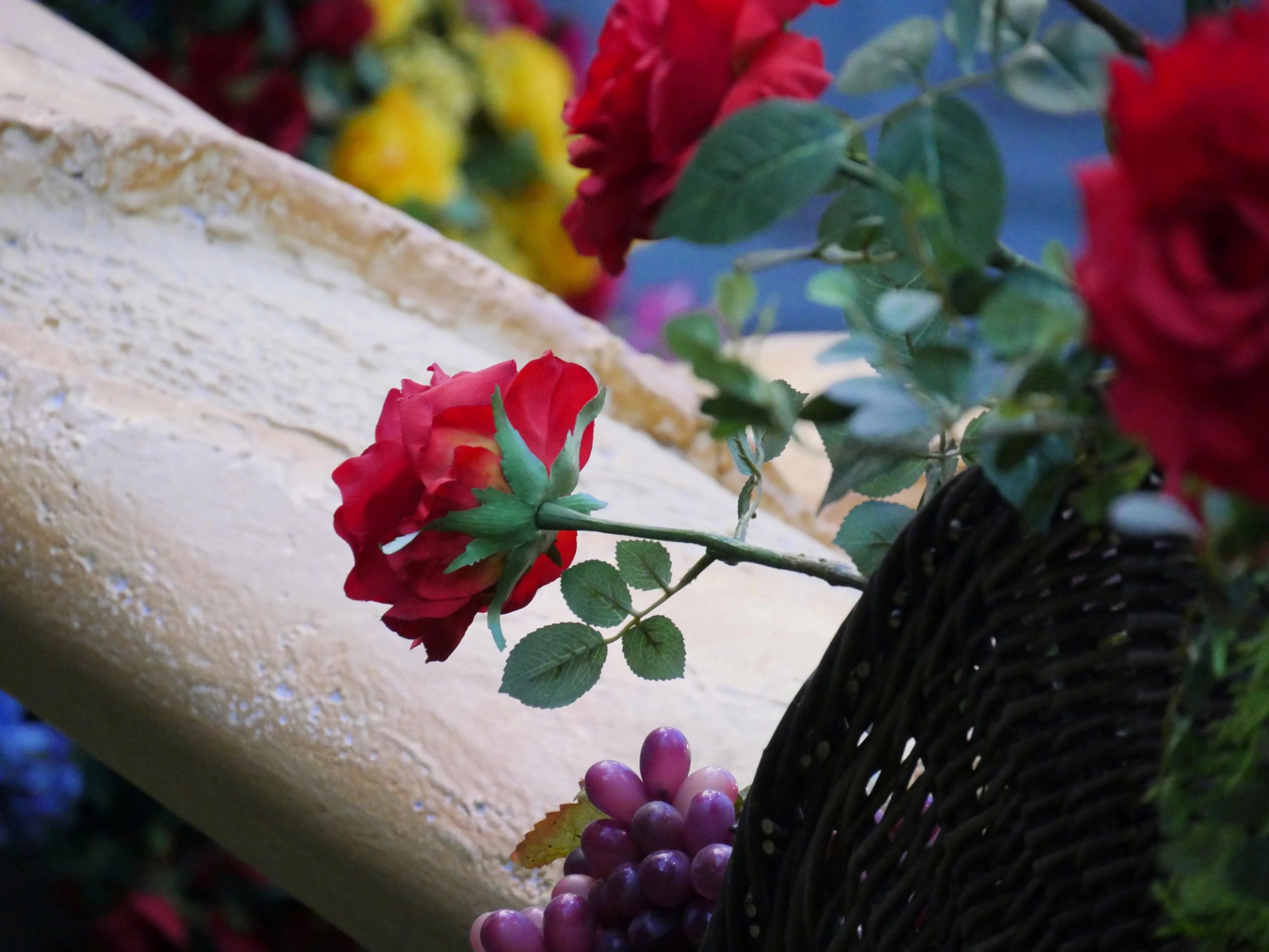 Sympathy flower arrangement with roses